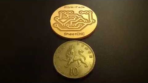 Early SheetCNC Mk1 cutting a tiny printed-circuit board.