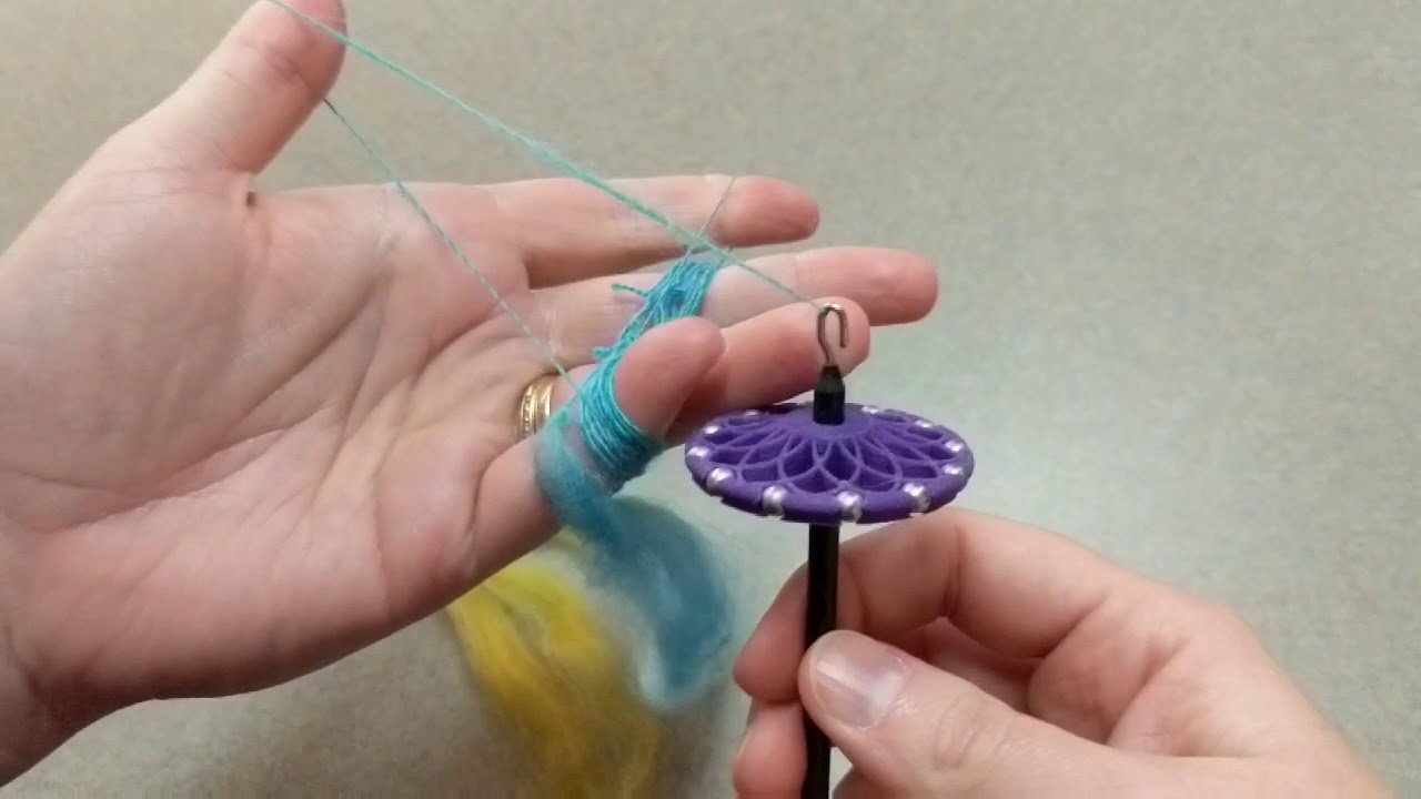 How to Ply on the Fly on a Top Whorl Drop Spindle