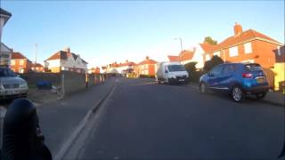 The moment BMW driver tries to shove cyclist off bike, caught on headcam