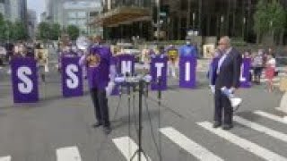 Protesters call for essential worker hazard pay