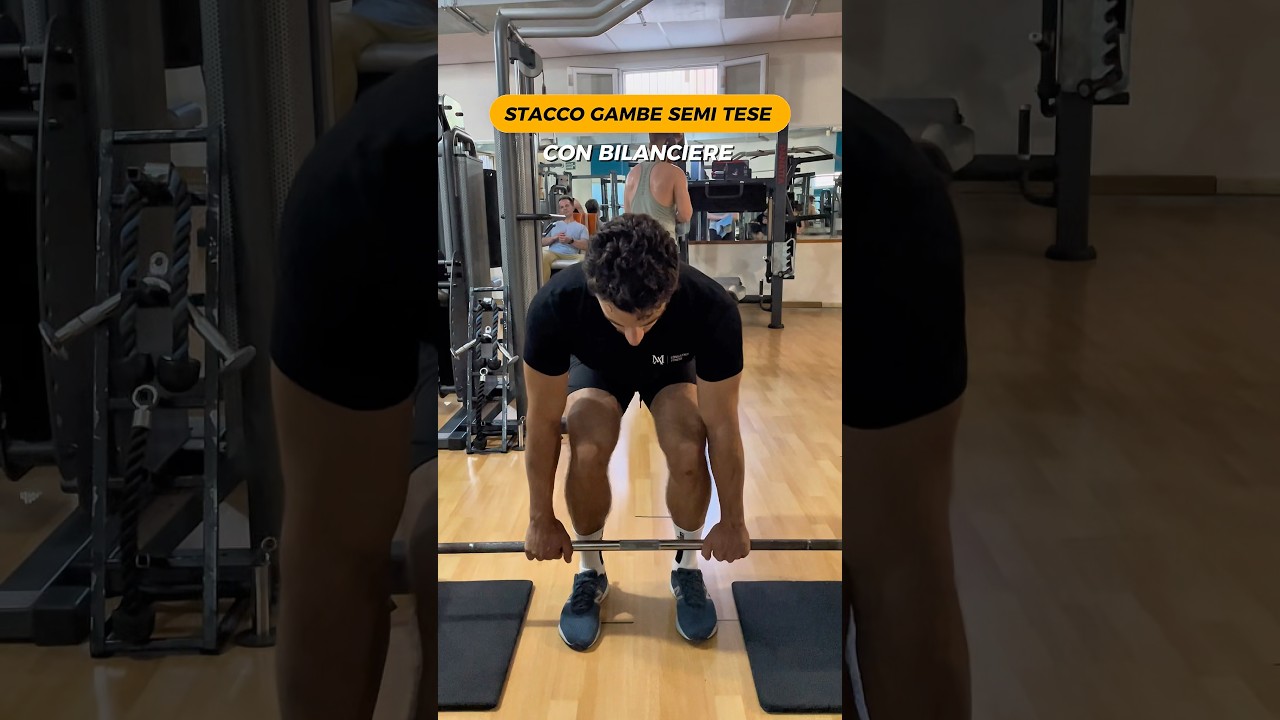 Stacco gambe semi tese - con bilanciere