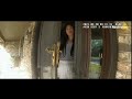 The first crazy lady video: Before slapping the cop
