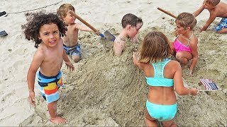 Kid Gets Buried In The Sand