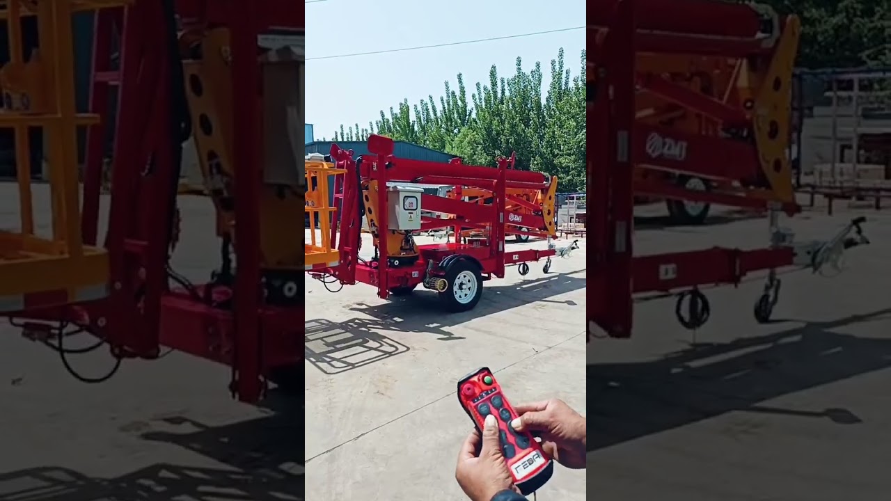 Red towable boom lift#youtubesearch #automobile #boomlift #heavyequipment #excavator #lifting