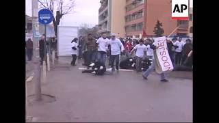 Riot police fire tear gas to break up protest by ethnic Albanians