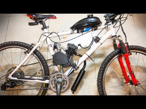 Vídeo: Com Muntar Una Bicicleta En Un Motor