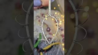 Wire wrapping this druzy stone teardrop in Argentium silver with a Viking weave #wirewrappedjewelry