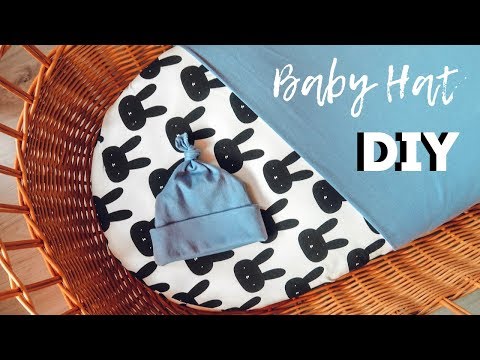 Video: How To Tie A Baby Hat