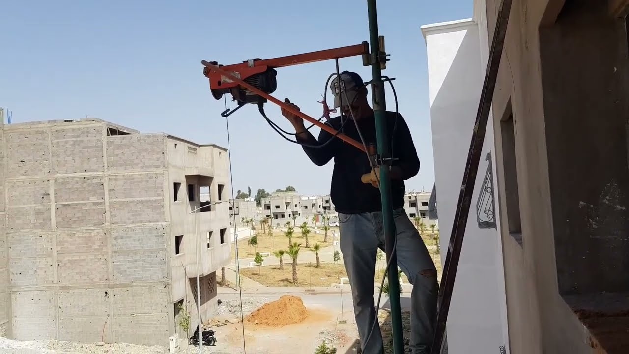 طريقة تركيب بوجي كهربائي على عمود لي حمل السلع الى سطح  اسهل طريقة