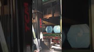 Unloading Lance pipe from Container