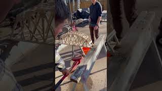 Physics boys testing their bridge