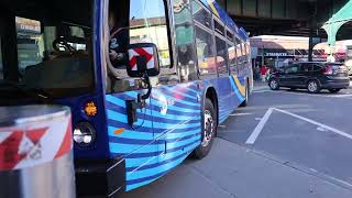MTA Bus #9236 on the Q33 to the 74th St Bus Term entering the 74th St Bus Term