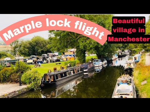 The marple lock flight/16 canal locks/stock port/village in Manchester