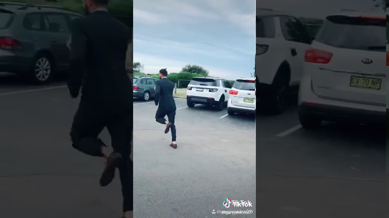 Hilarious Man runs to the ocean with suit ☺️