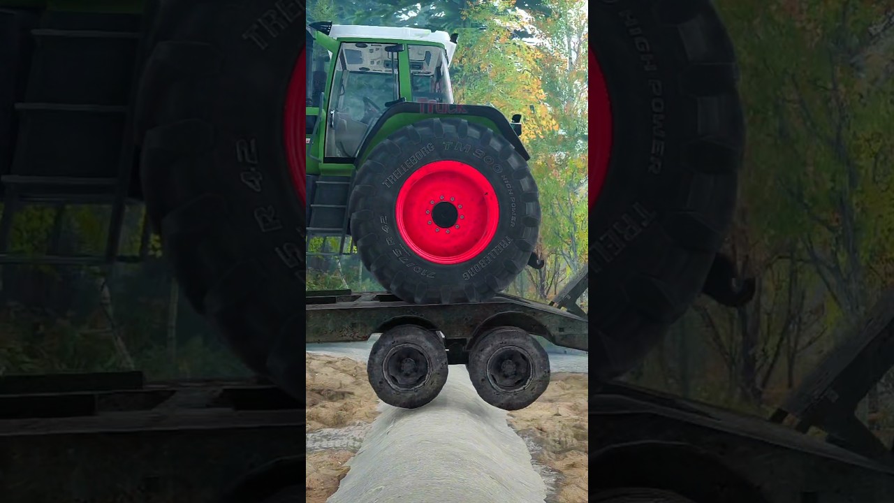 Truck Towing JD Tractor Crossing Bumpy Road 