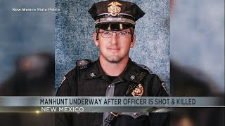 Manhunt underway after officer is shot & killed in New Mexico