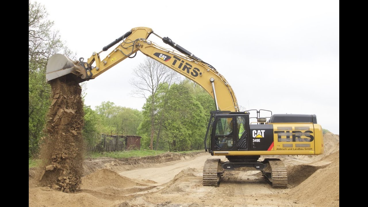Caterpillar 349 E baut gesiebten Sand ein / TIRS Abbruch