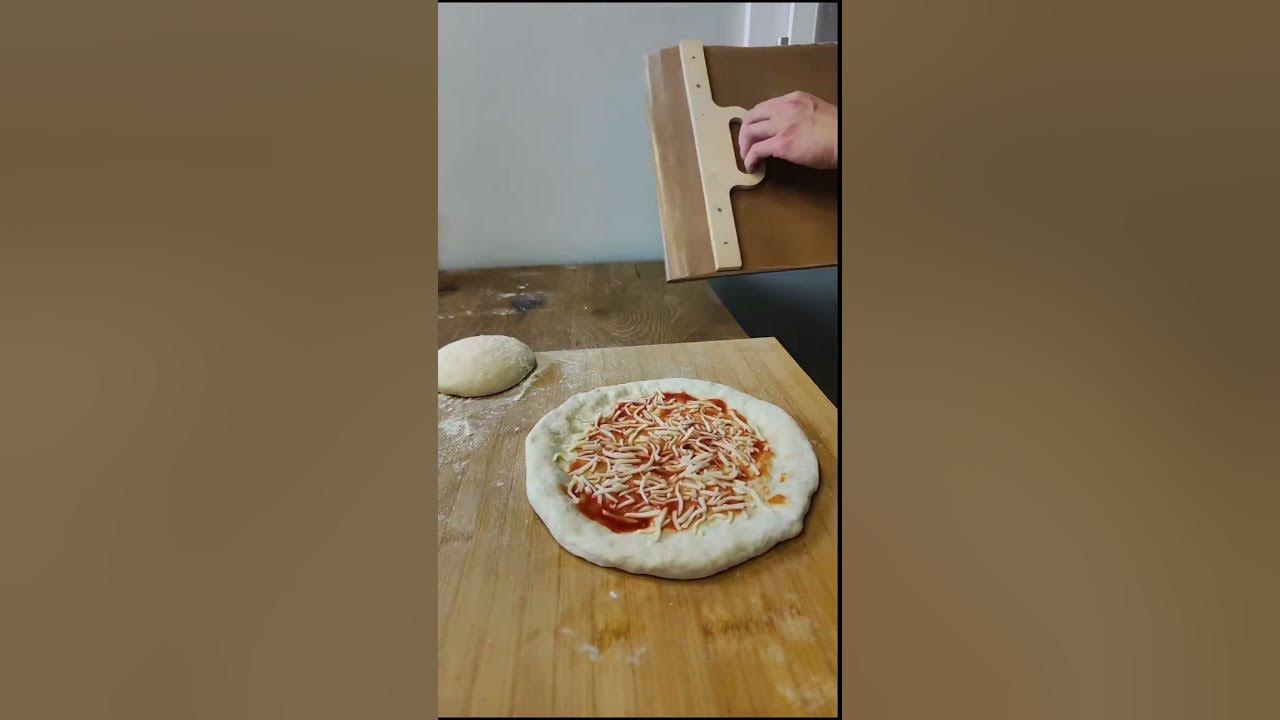 🍕✨ Découvrez la magie de la Pelle à Pizza Coulissante Effesto! Avec s