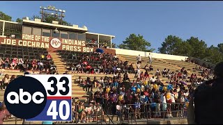 Friends and family hold vigil for basketball star Caleb White