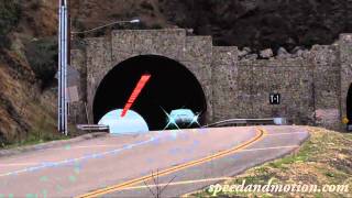Ferrari 599 GTO out of a tunnel and downshifting
