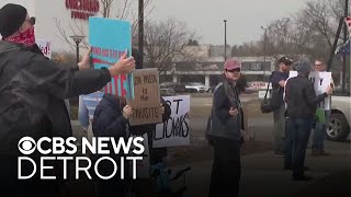 Musk, Tesla protesters gather at dealership