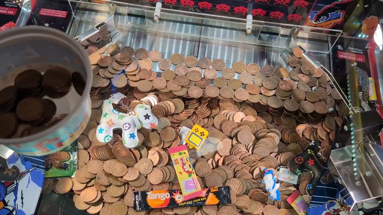 Playing The Space Invaders 2p Coin Pusher In Barry Island