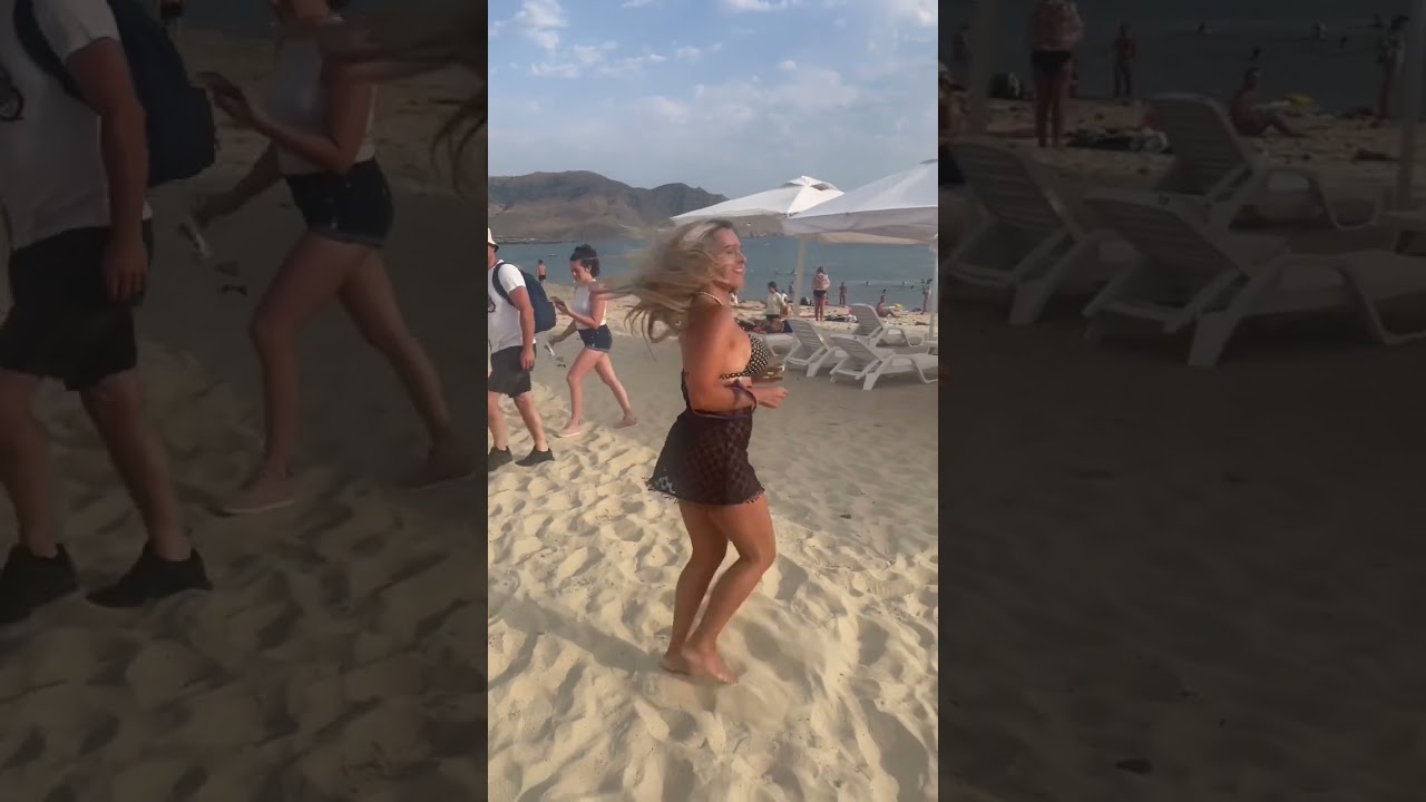 Hairdresser Dancing on the Beach