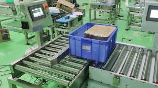 21.873 kg Crate on a Powered Roller Checkweigher