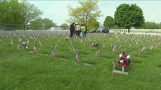 Families visit national cemeteries to remember their heroes
