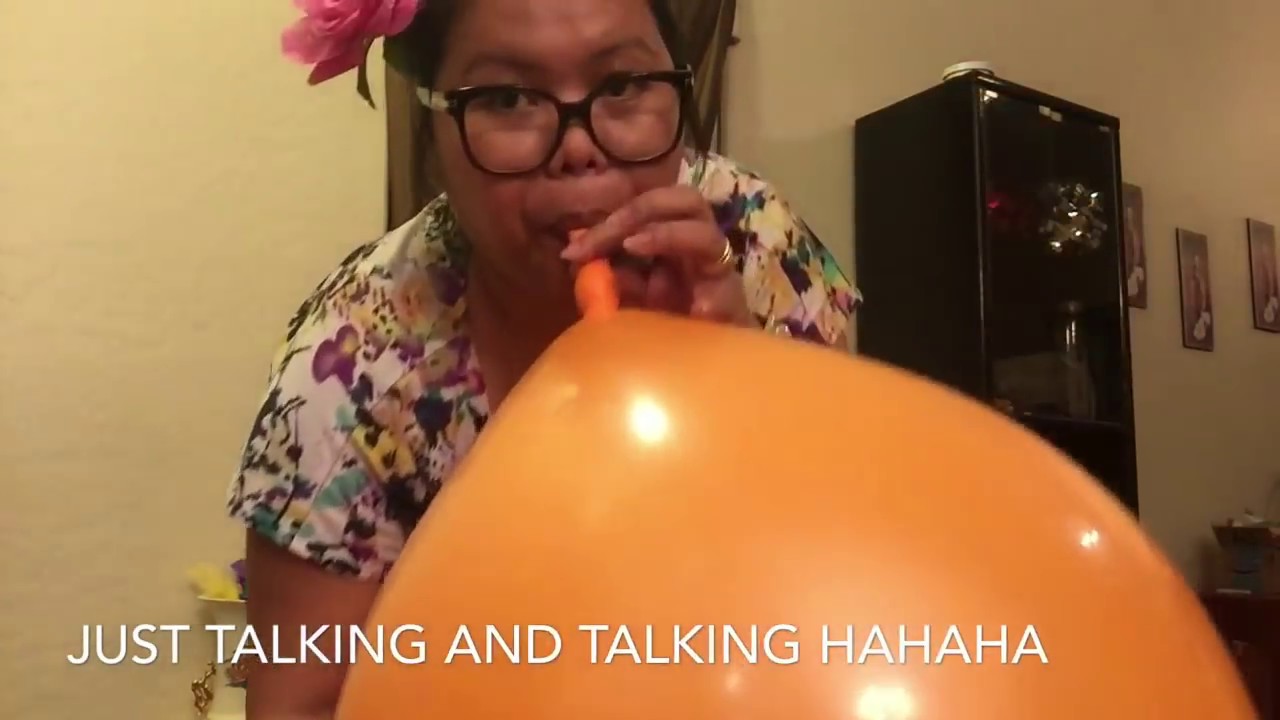Blowing orange Balloon and popping it - YouTube