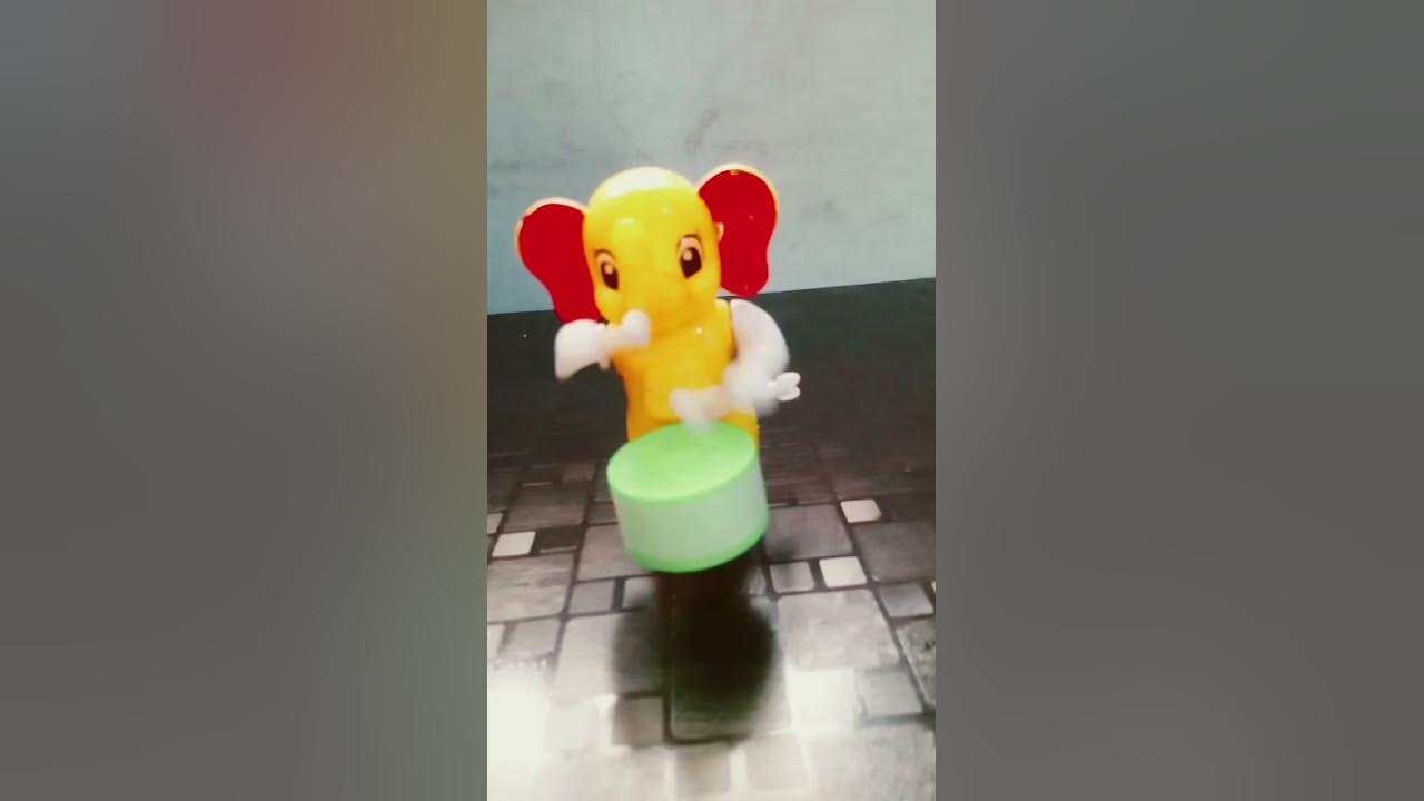 toy-elephant-beating-the-drum-youtube