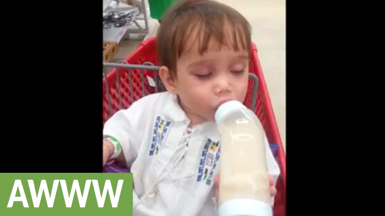 Baby can't decide between sleeping and his bottle YouTube