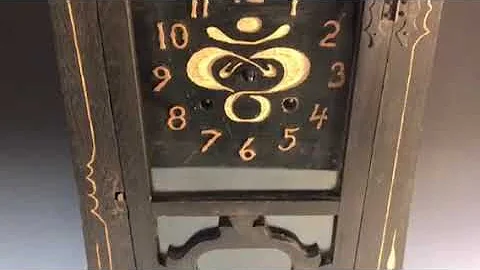 Charles Rohlfs style clock carving