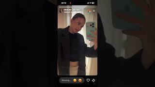 Rich girl showing her belly button on camera