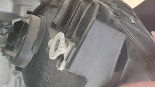 How to replace the headlight bulb in a Mitsubishi Eclipse Spyder