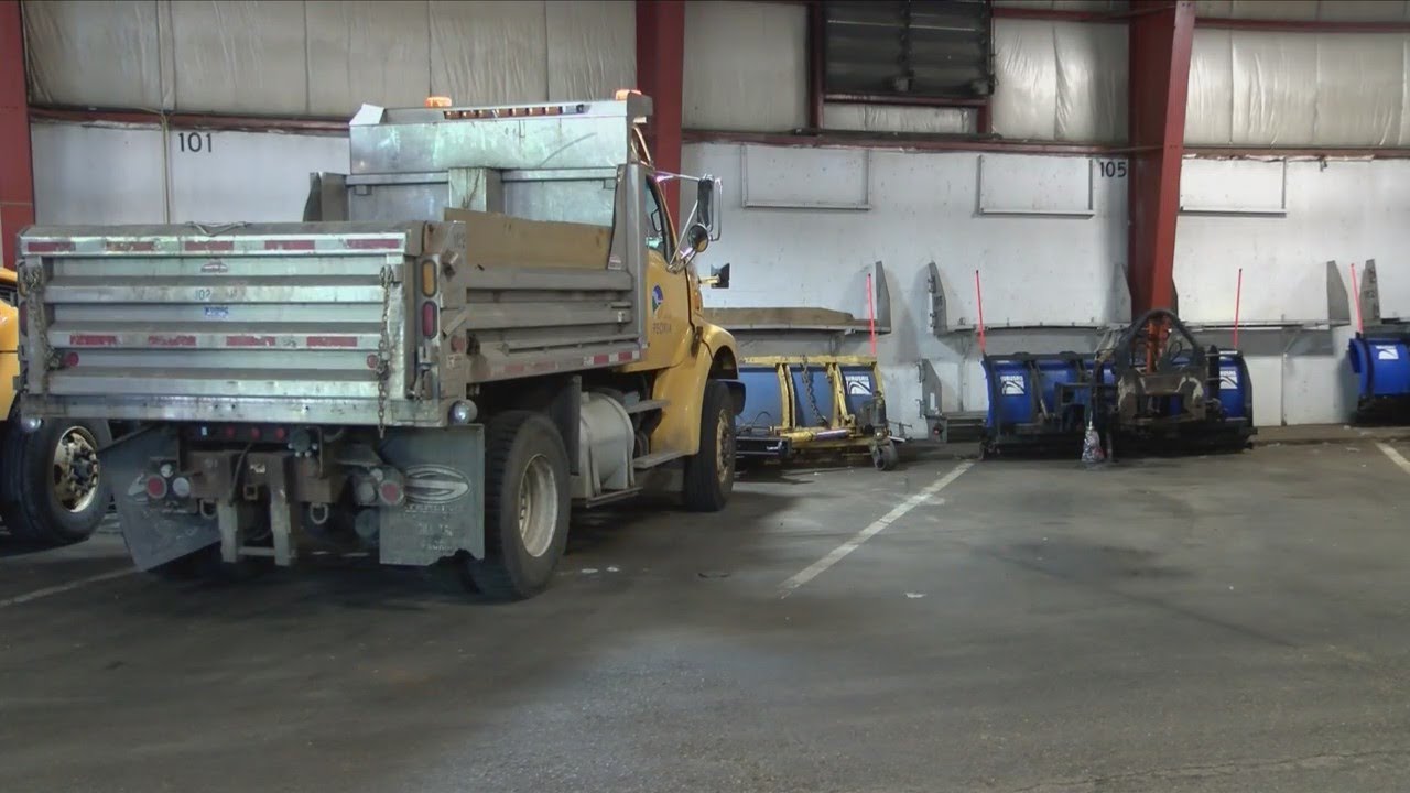 Road crews prepare for winter as summer heat swelters - YouTube