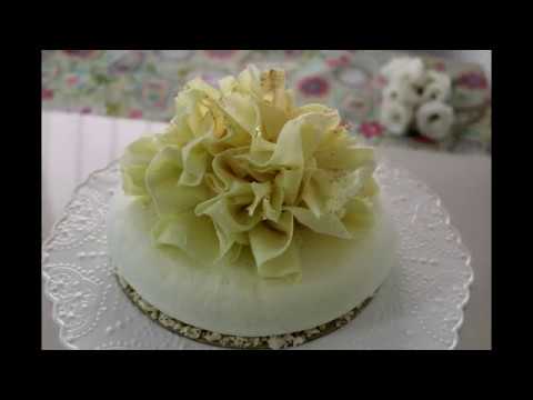 וִידֵאוֹ: איך מכינים קישוט לעוגה: פרחי פונדנט