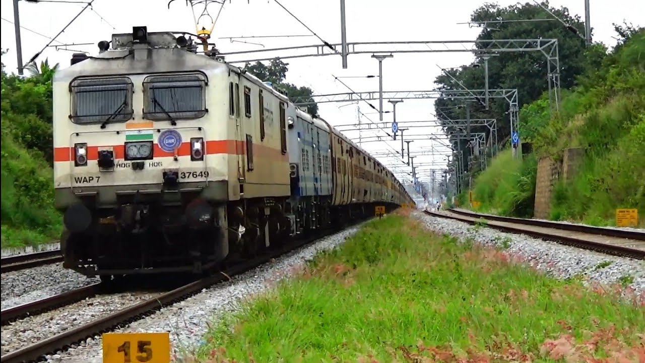 WAP 7 tows a Diesel Electric Tower Car (DETC)