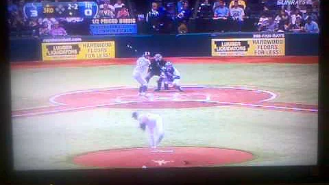 Rays fan spills beer and flips over he railing