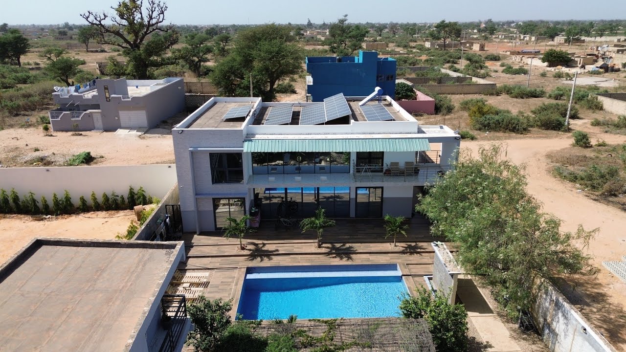 Testing out the AfroDrone over our Malicounda neighborhood | Living in Senegal 🇸🇳