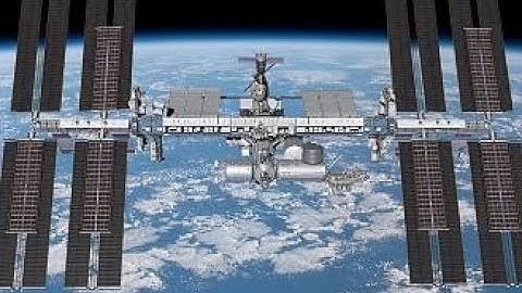 French and US astronauts spacewalk to install solar panel system on ISS | LIVE