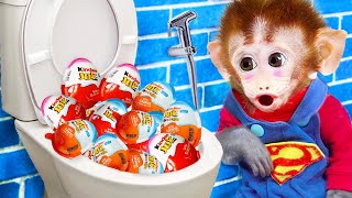 Monkey baby Bi Bon go to the toilet and eat Kinder Joy Eggs candy with puppy | Animals Home Monkey