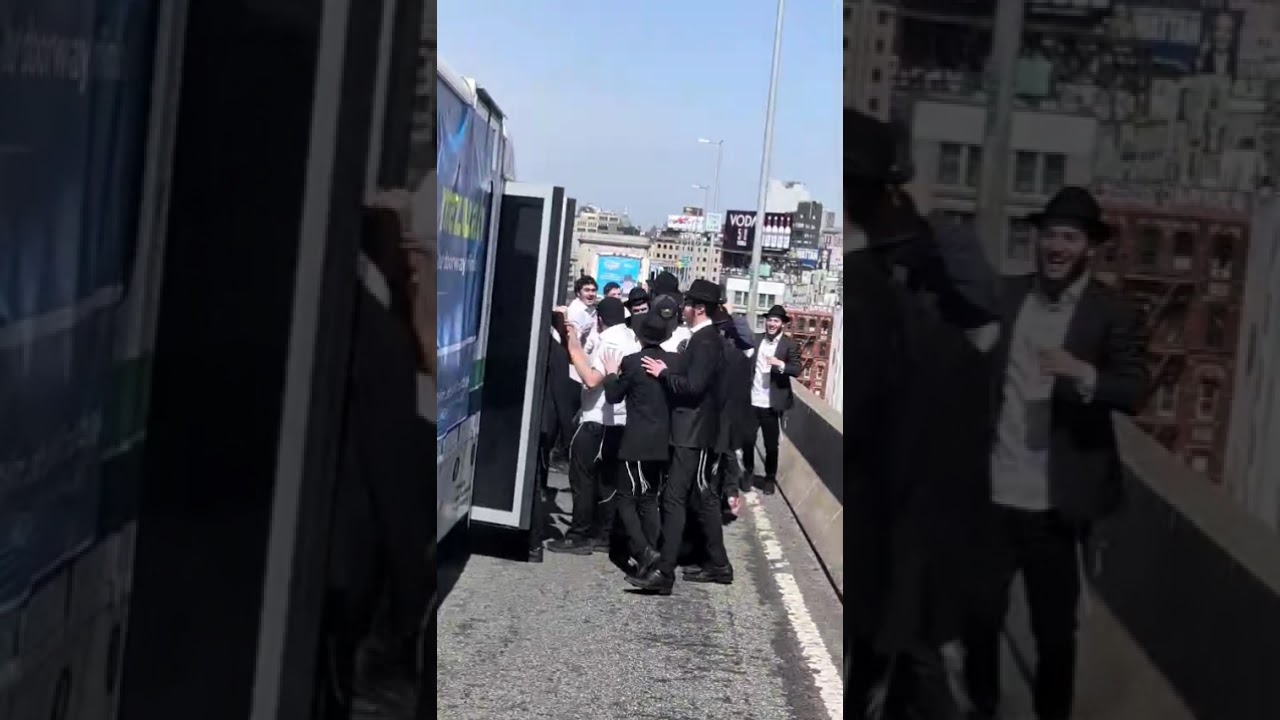 Bochurim dance on the Mitzvah Tank Parade
