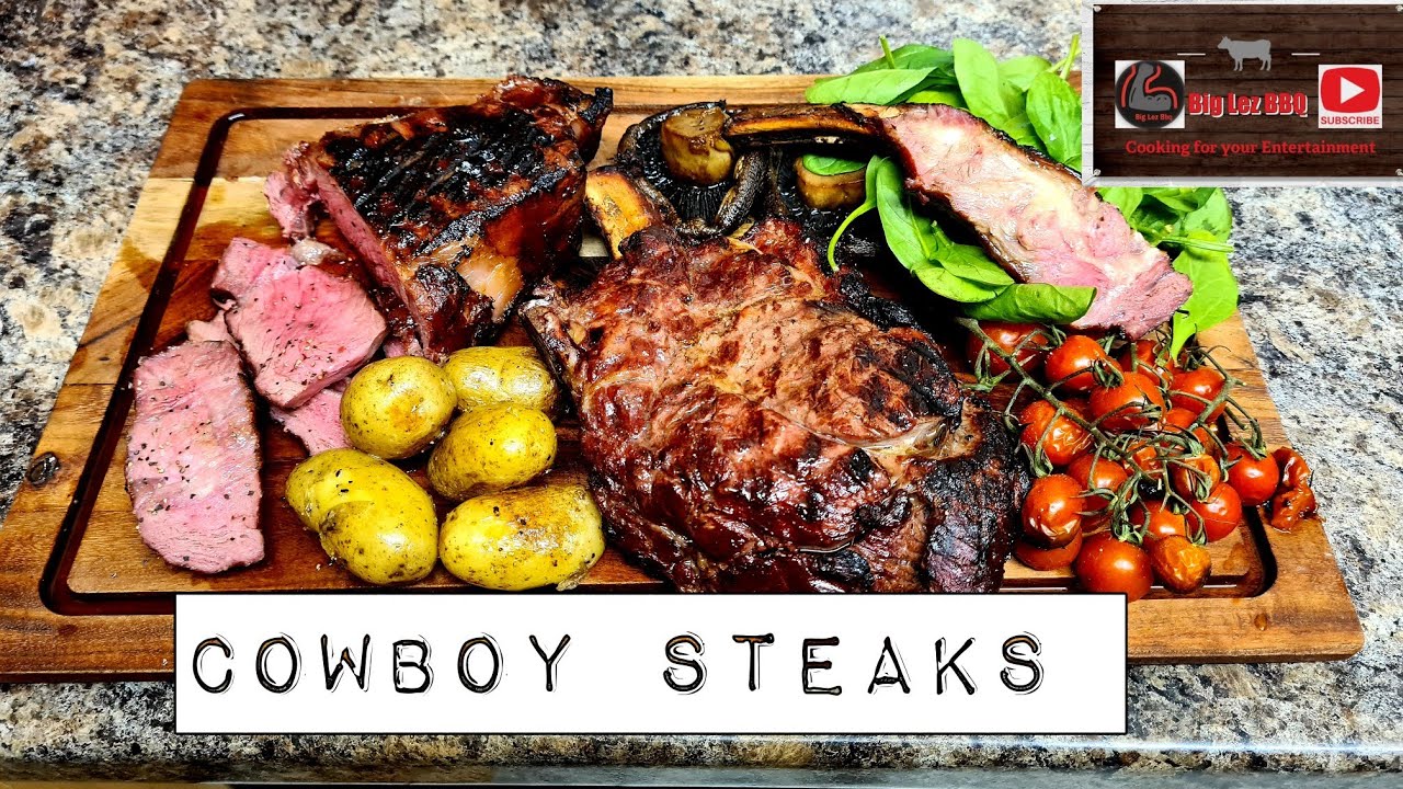 Cowboy steaks reverse seared on the Kamado kettle joe. with garlic