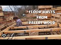 Framing 2nd story floor of the tiny pallet house in the woods