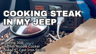 Cooking steak in my Jeep using Jackery 300, the My Mini Noodle Cooker & 5” Lodge Cast Iron skillet