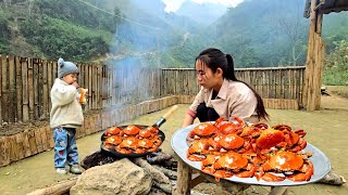 Single mother Tieu Ca carries stones to build roads and catches crabs to sell.