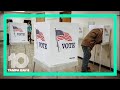 Who is allowed inside a polling place?
