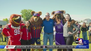 Students join annual 'Hawk Walk' event to raise money for cancer