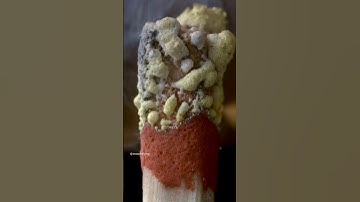 A matchstick igniting by the friction surface of the box.